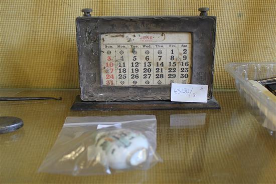 Silver desk calendar and a Chinese snuff bottle